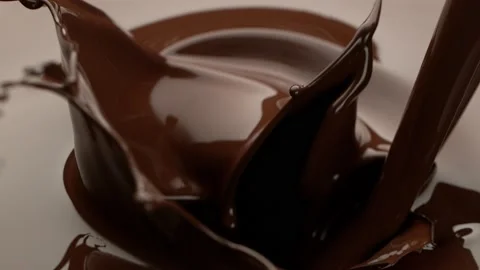 Super slow motion of pouring dark hot chocolate. Stock Footage 150622918