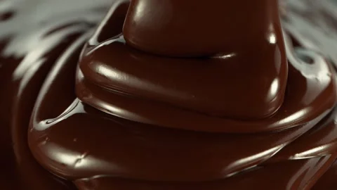 Super slow motion of pouring dark hot chocolate. Stock Footage 201467911