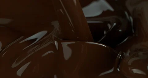 Super slow motion of pouring dark hot chocolate. Stock Footage 216660048