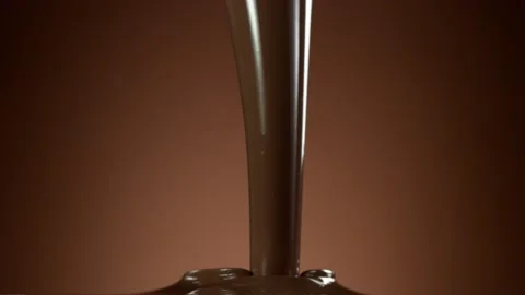 Super slow motion of pouring hot chocolate. Stock Footage 140341973