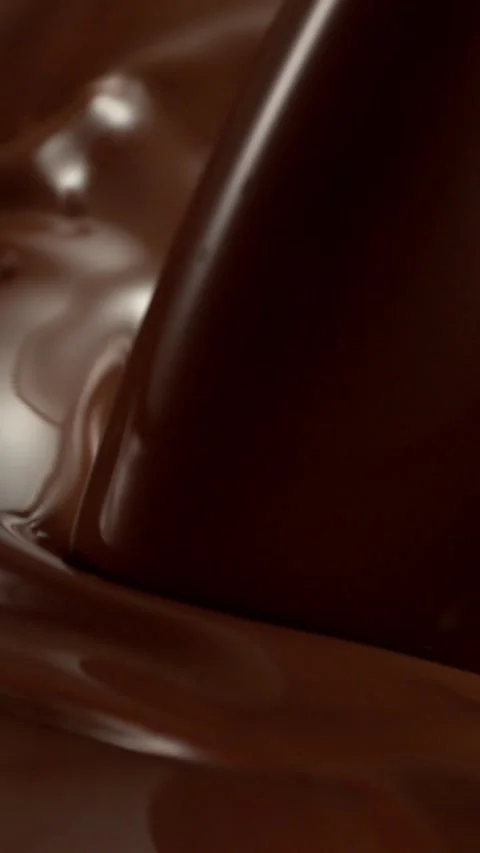 Super Slow Motion of Pouring Hot Melted Chocolate. Stock Footage 297449505