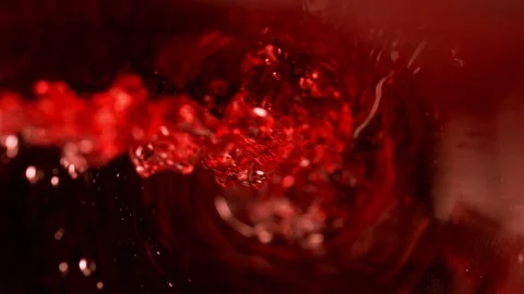 Super slow motion of pouring red wine, inside bottle view. Stock Footage 119983091