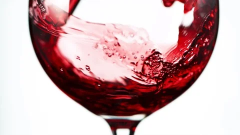 Super slow motion of pouring red wine in detail, isolated on white background Stock Footage 120397237