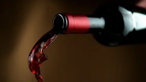 Super slow motion of pouring red wine from bottle Stock Footage 121469189