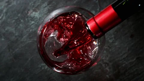Super slow motion of pouring red wine into glass. Stock Footage 165218086