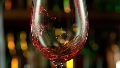 Super slow motion of pouring red wine into glass with speed motion Stock Footage 232213967