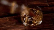 Super Slow Motion Of Pouring Whiskey Into Glass, Top View. Stock Footage