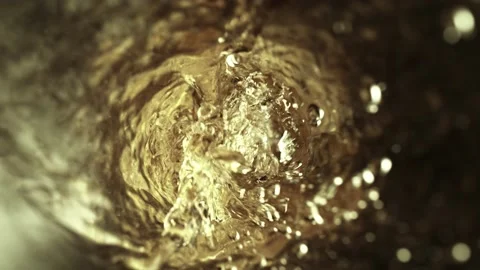 Super slow motion of pouring white wine into glass with camera motion Stock Footage 157729676