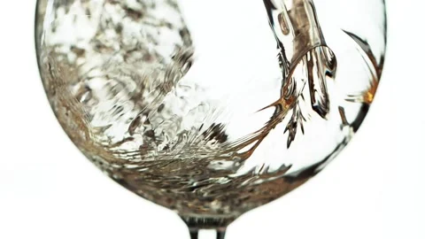Super slow motion of pouring white wine into glass in detail. Stock Footage 165295138