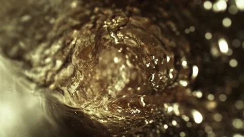 Super slow motion of pouring white wine into glass with camera motion Stock Footage 168092015