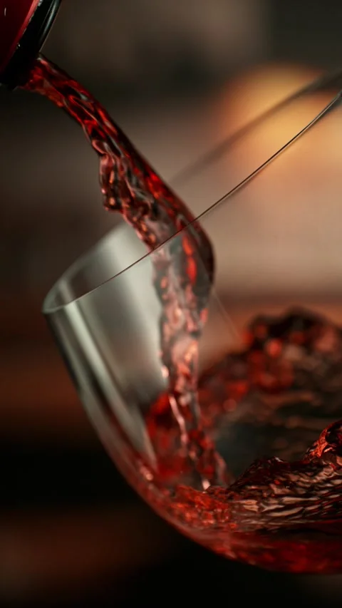 Super Slow Motion of Pouring White Wine into Glass. Stock Footage 288008271