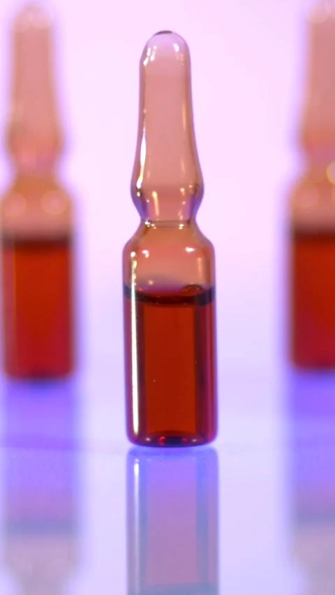 Super Slow Motion Product Presentation With Tilted Ampoule Over Gradient Stock Footage 333485348