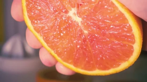 Super slow motion push grapefruit juice Video stock 72215498
