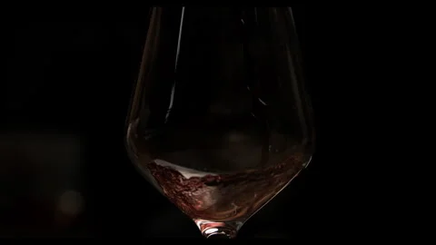 Super Slow Motion Red Wine Pouring in Glass Stock Footage 270408940