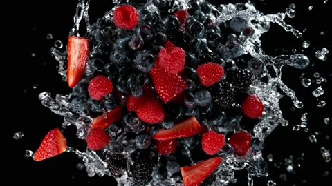 Super slow motion of rotating berries with splash water, black background Stock Footage 171190893