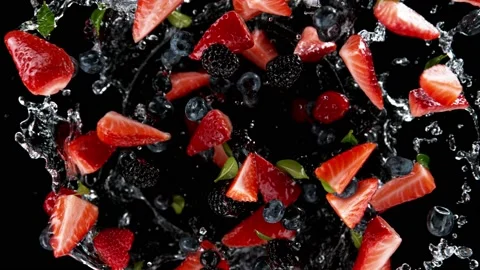 Super slow motion of rotating berries with splash water, black background Stock Footage 171191058