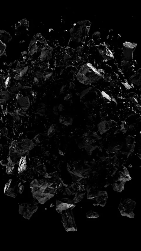 Super slow motion of rotating coal pieces on black background. Stock Footage 306575447