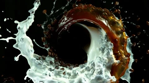 Super slow motion of rotating coffee beans with ice cubes and splashes. Stock Footage 134439455