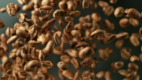 Super slow motion of rotating coffee beans. Stock Footage 237155259