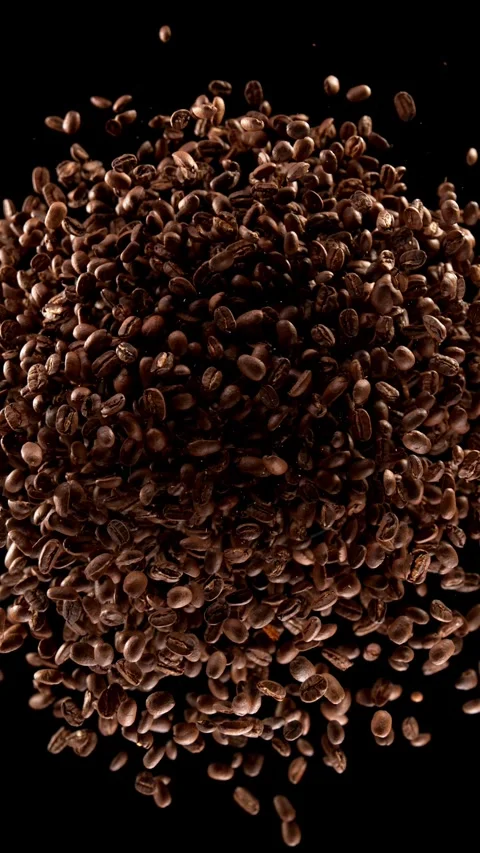 Super slow motion of rotating coffee beans. Stock Footage 306576745