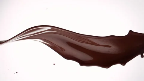 Super slow motion of rotating dark hot chocolate splashes Stock Footage 150939493