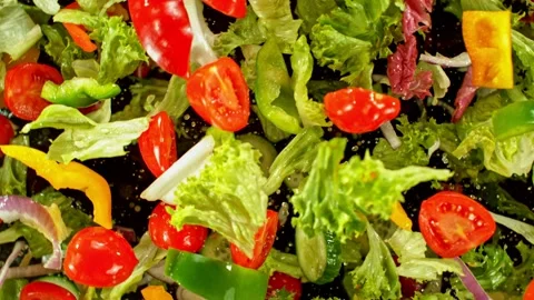 Super slow motion of rotating fresh lettuce flying up in the air Stock Footage 239430398