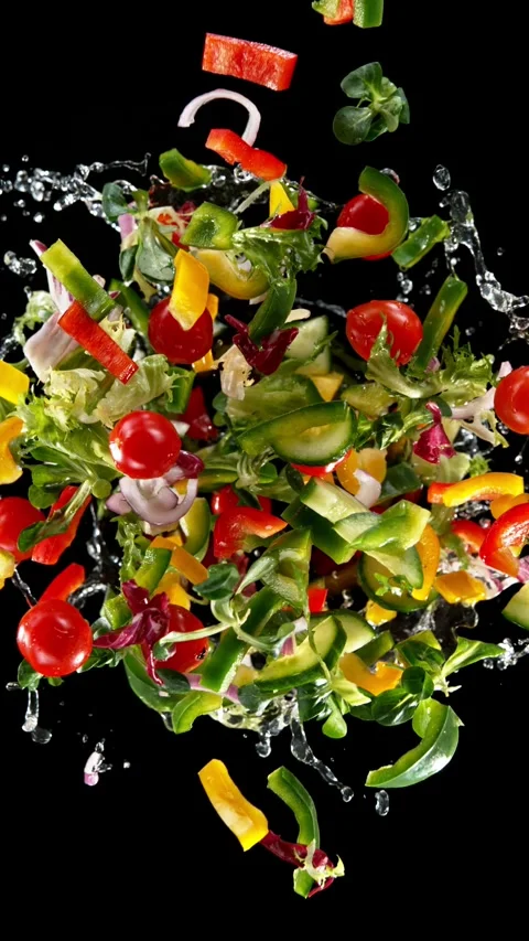 Super slow motion of rotating fresh lettuce flying up in the air. Stock Footage 306577471