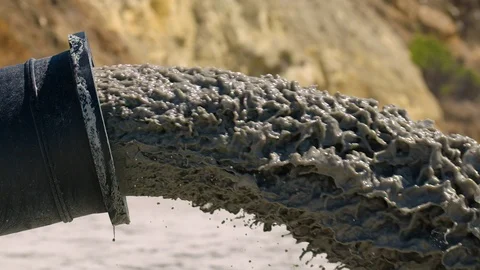 Super slow motion of sand expelling onto beach reclamation. Stock Footage 92337736
