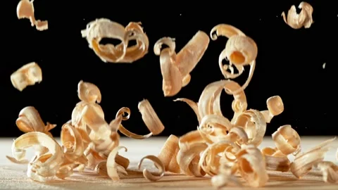 Super slow motion of sawdust particles falling down, Stock Footage 199762273