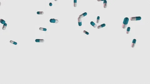 Super slow motion shooting of flying blue and white pills. They fall from above. Stock Footage 147477407