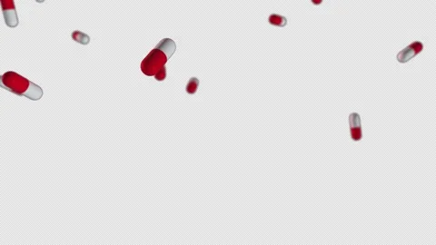 Super slow motion shooting of flying red and white pills. They fall from above.  Stock Footage 148520001