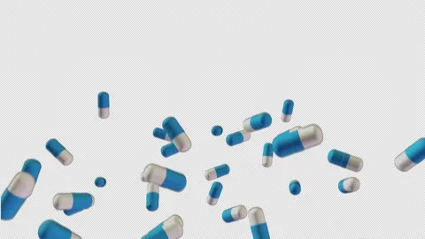 Super slow-motion shooting of multi-colored tablets, tossed up. Loop, alpha chan Stock Footage 156440402