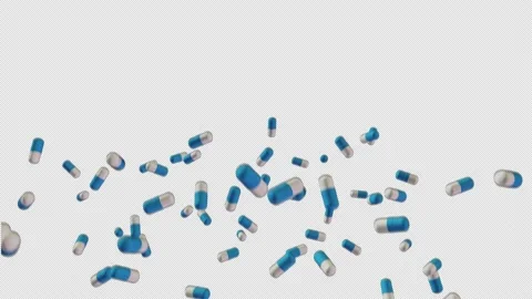 Super slow-motion shooting of multi-colored tablets, tossed up. Loop, alpha chan Stock Footage 156440553