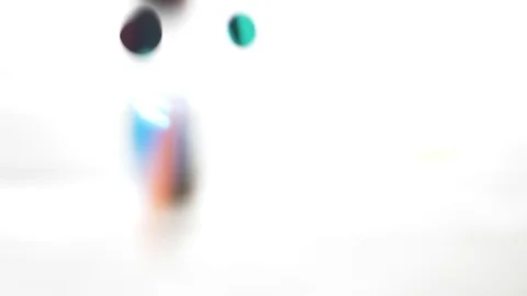 Super slow-motion shooting. round multicolored confetti fall and whirl in the Stock Footage 88699022