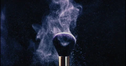 Super Slow Motion Shot of Blue Makeup Powder Falling from Facial Brush. Stock Footage 245273959