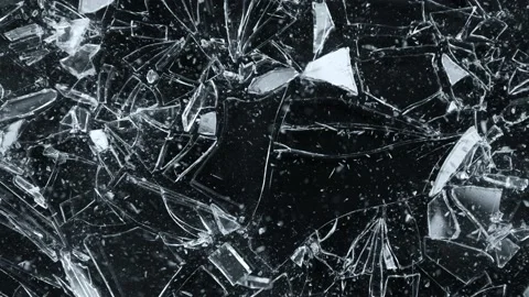 Super Slow Motion Shot of Breaking Real Glass at 1000 fps. Isolated on Black Stock Footage 207478864