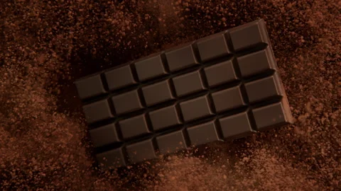 Super Slow Motion Shot of Chocolate Bar and Cocoa Powder Exploded Towards Camera Video stock 301401036