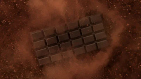 Super Slow Motion Shot of Chocolate Bar and Cocoa Powder Exploded Towards Camera Video stock 303816877