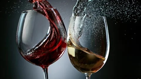 Super Slow Motion Shot of Clinking Red and White Wine at 1000fps. Stock Footage 143688772