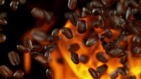 Super Slow Motion Shot of Coffee Beans and Flames after Being Exploded at Stock Footage 115106074