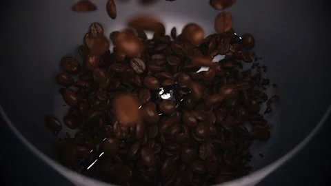 Super Slow Motion Shot of Coffee Beams Exploding in Coffee Grinder on Studio Stock Footage 230100219