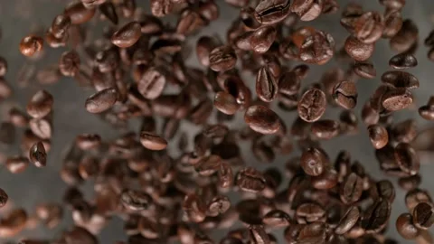 Super Slow Motion Shot of Coffee Beans and Smoke Explosion Towards with Camera Stock Footage 234806956
