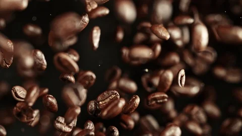 Super Slow Motion Shot of Exploding Premium Coffee Beans Towards the Camera at 스톡 동영상 113687265