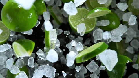 Super Slow Motion Shot of Exploding Crushed Ice and Lime Towards Camera at 스톡 동영상 120637932