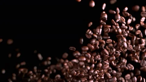 Super Slow Motion Shot of Exploding Premium Coffee Beans Isolated on Black at Stock Footage 167225426