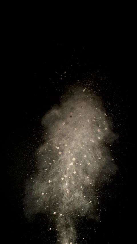 Super Slow Motion Shot of Exploding Soil, Rocks and Dust Isolated on Black at Stock Footage 319767462
