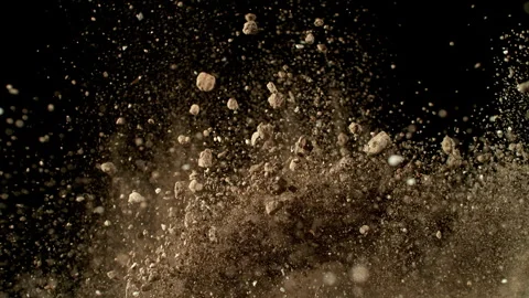 Super Slow Motion Shot of Exploding Soil with Rocks Camera at 1000fps. Stock Footage 319767622