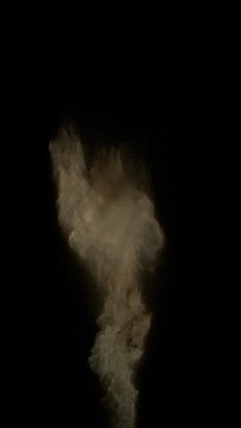 Super Slow Motion Shot of Exploding Soil and Dust Isolated on Black at 1000fps. Stock Footage 320391711