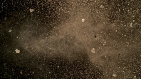Super Slow Motion Shot of Exploding Soil with Rocks at 1000fps. Stock Footage 320392177
