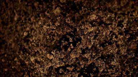 Super Slow Motion Shot of Exploding Soil Towards Camera at 1000fps. Stock Footage 325708226